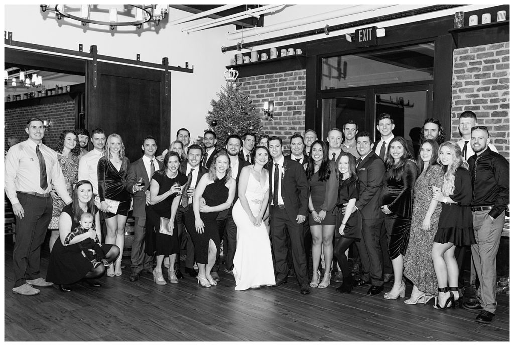bride and groom and all their friends celebrating at wedding reception in charlotte nc