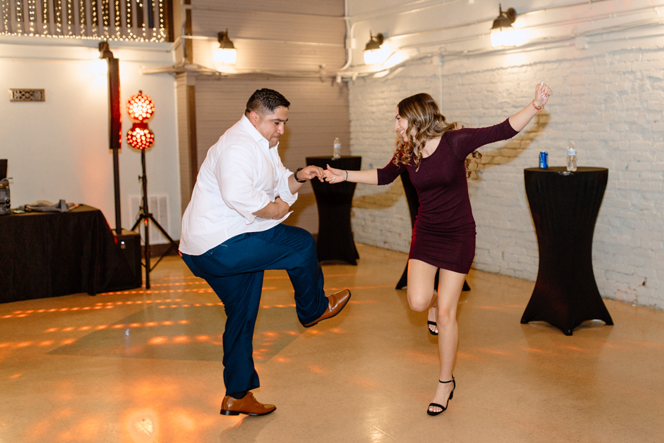 people dancing during reception at wilburn lofts